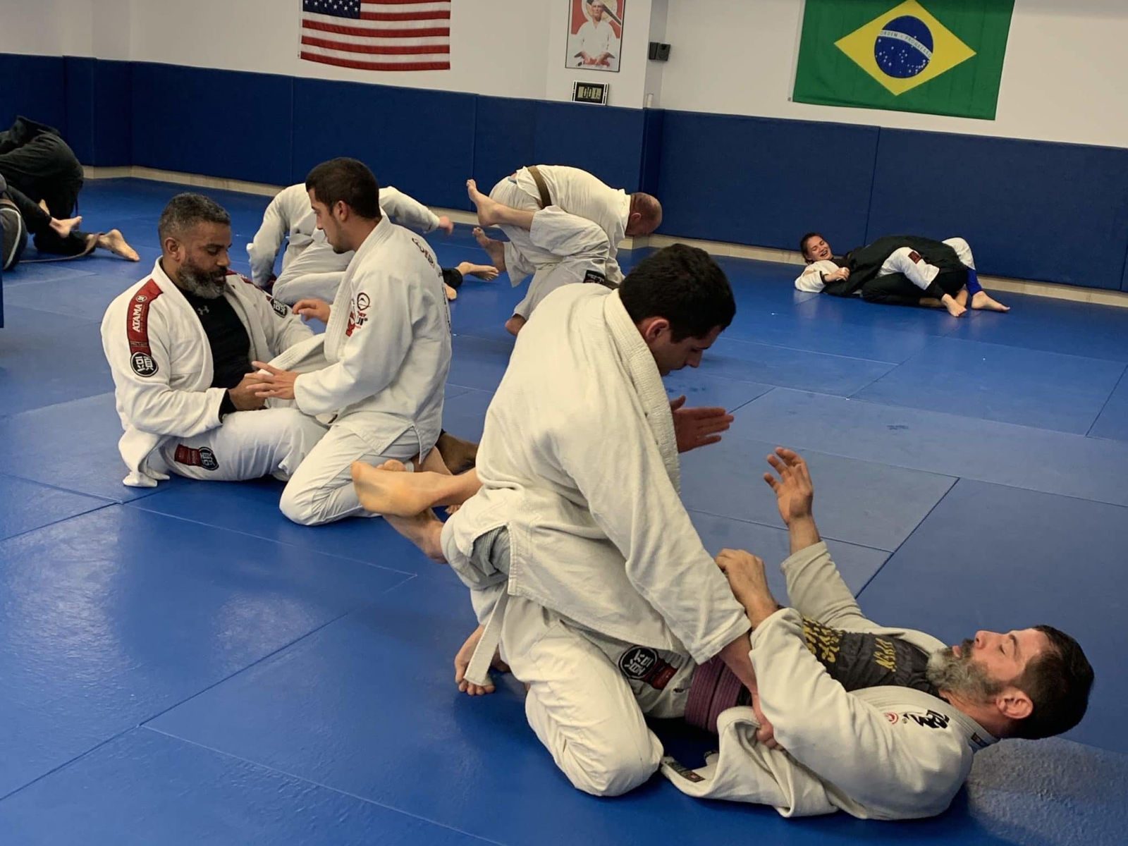 Mixed-level adult class training together
